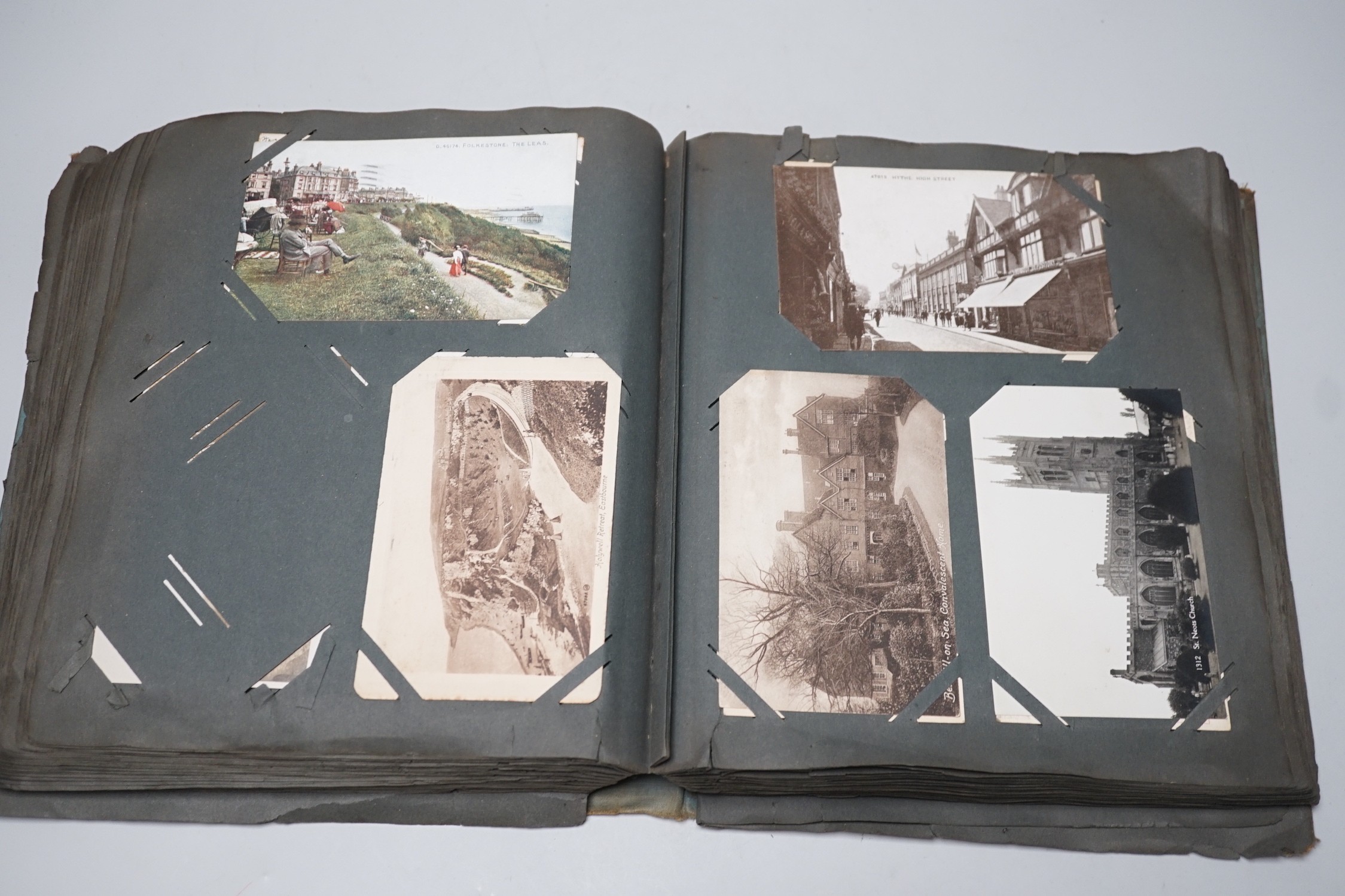 Three albums of topographical postcards